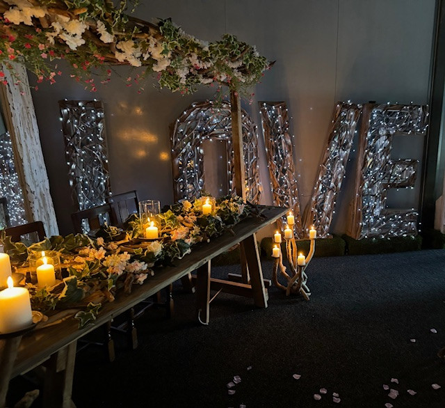 illuminated driftwood love letters